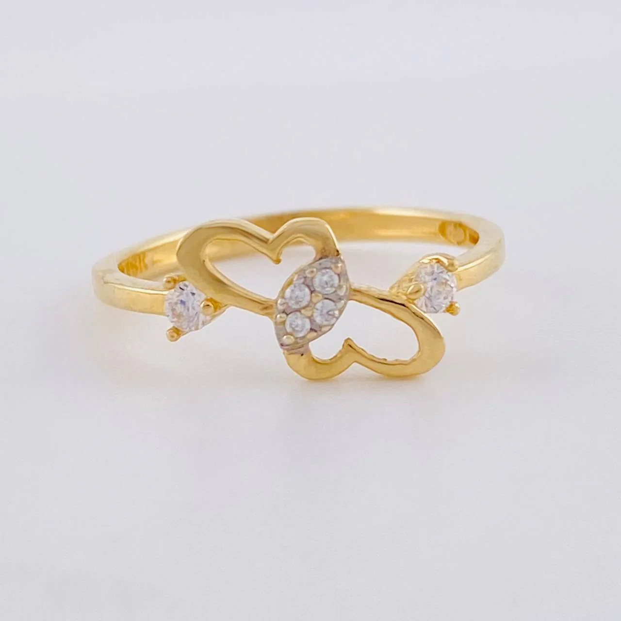 Anillo Corazon Entrelazados 1.4g / T4 1/2 Oro Amarillo 18K