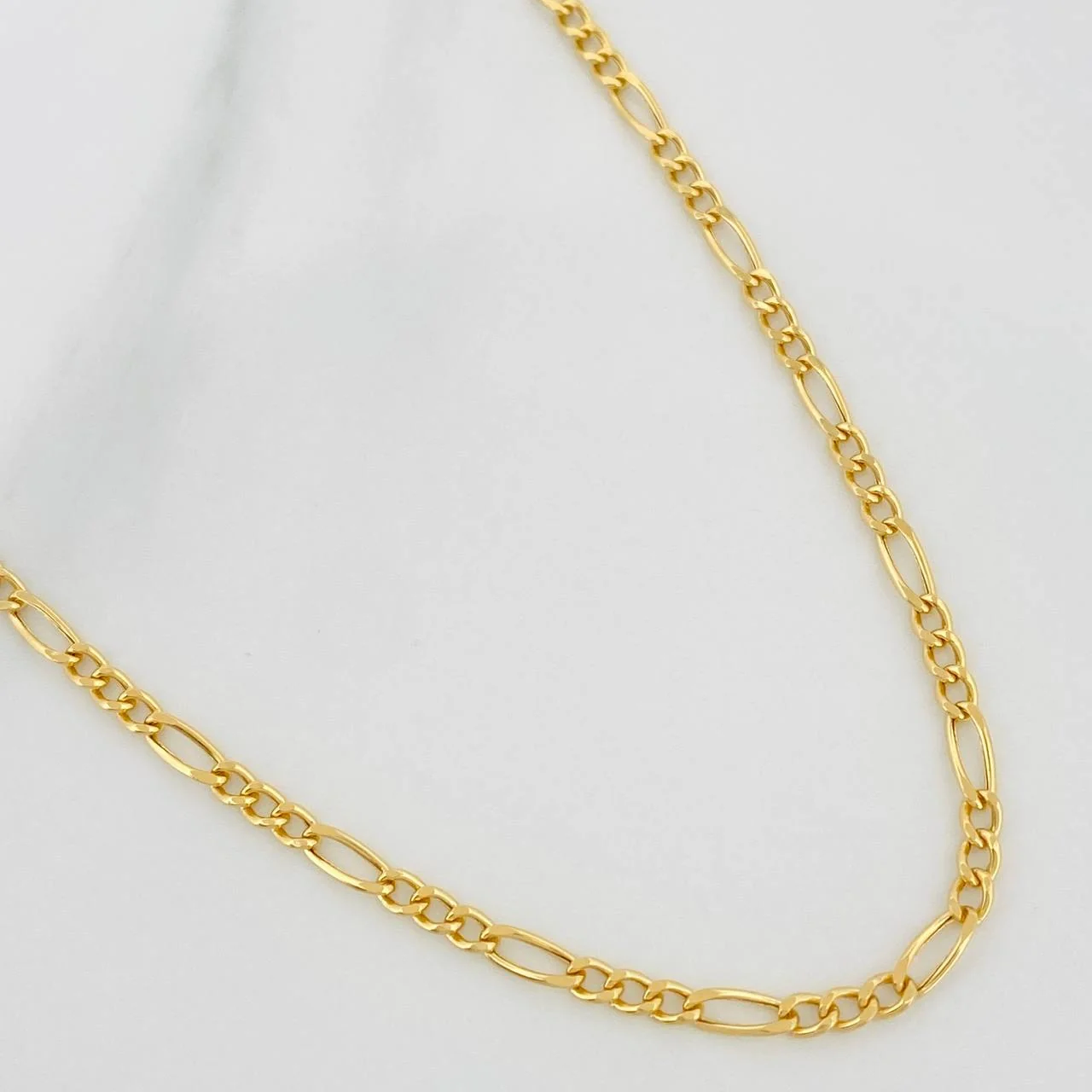 Cadena Figaro 3.1gr / 21 1/2 in / 2.05mm Oro Amarillo +1 18K $