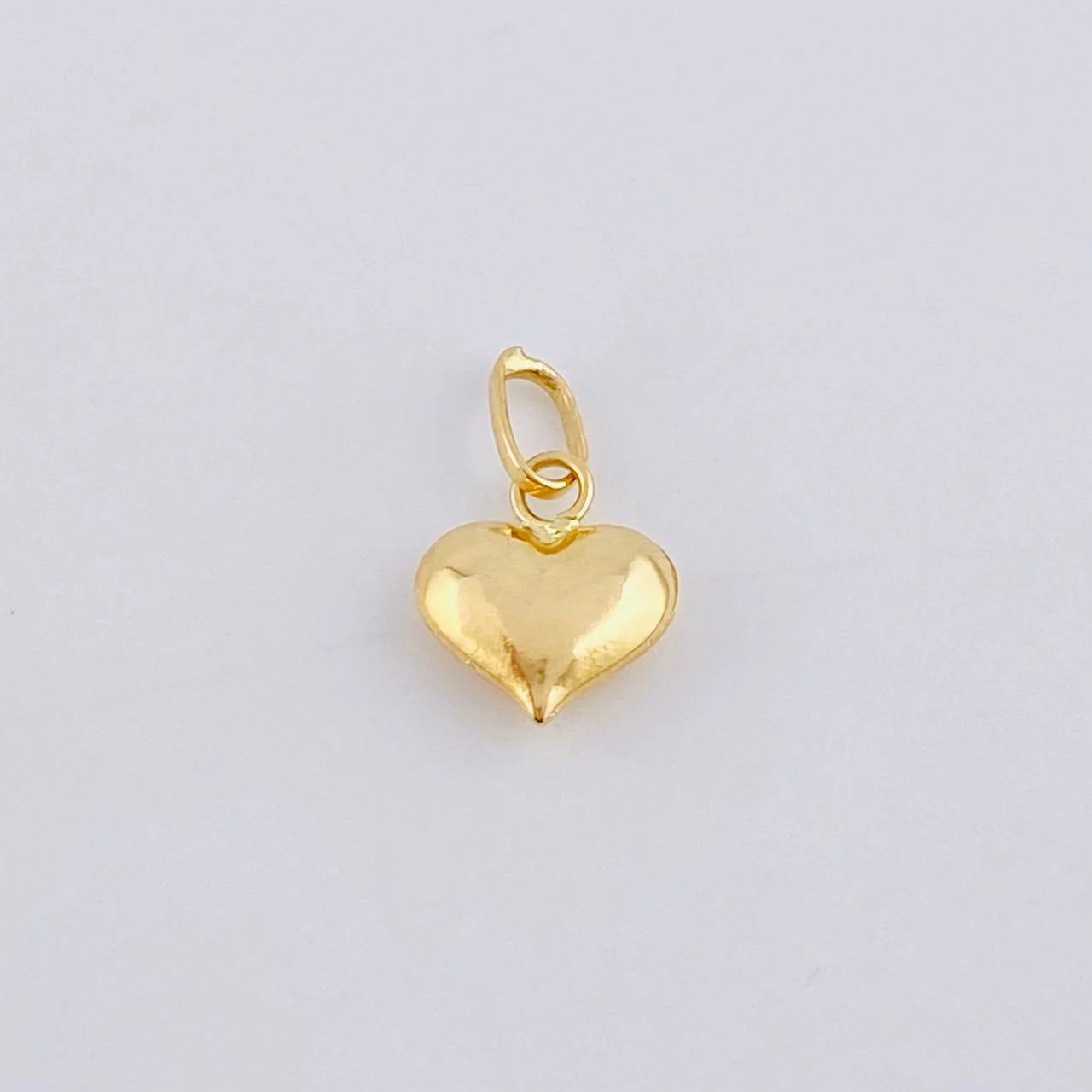 Dije Corazon 0.3 g / 1/2 in Oro Amarillo 18K