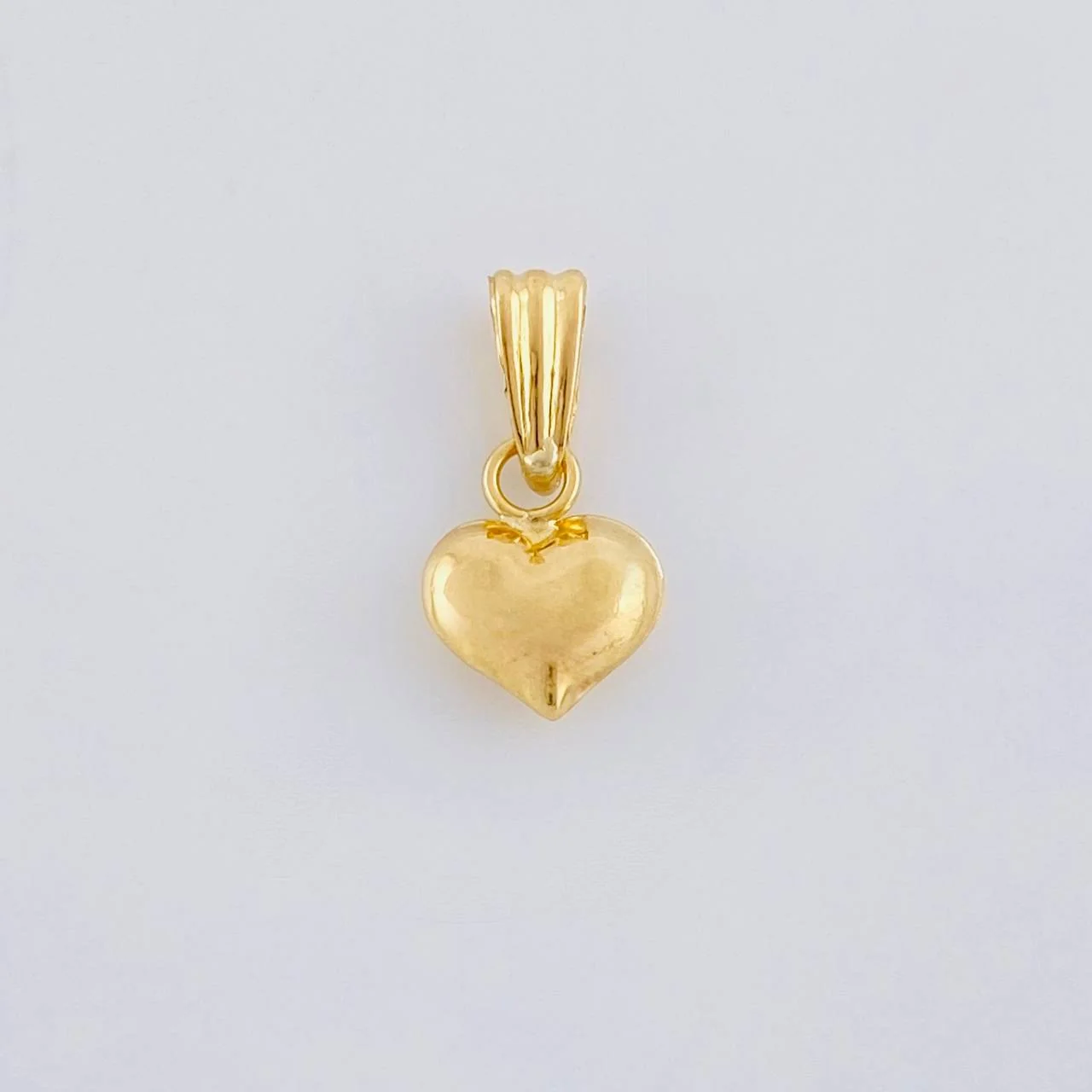 Dije Corazon 0.35 g / 1/2 in Oro Amarillo 18K