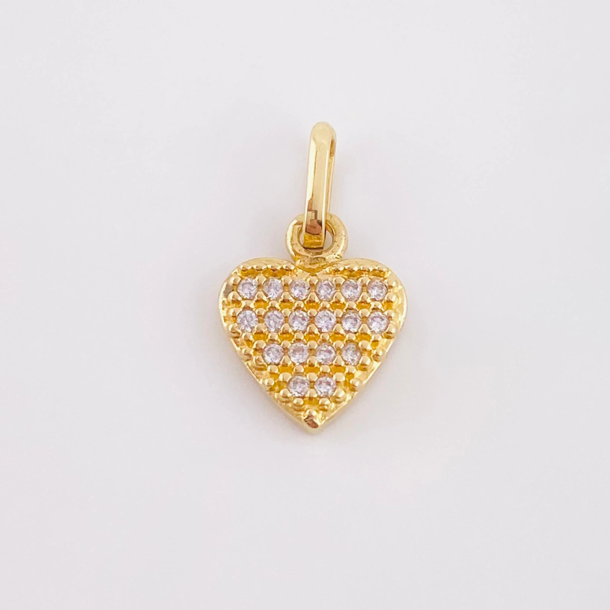 Dije Corazon Tupido 0.9gr / 1/2 in / Oro Amarillo 18K ©