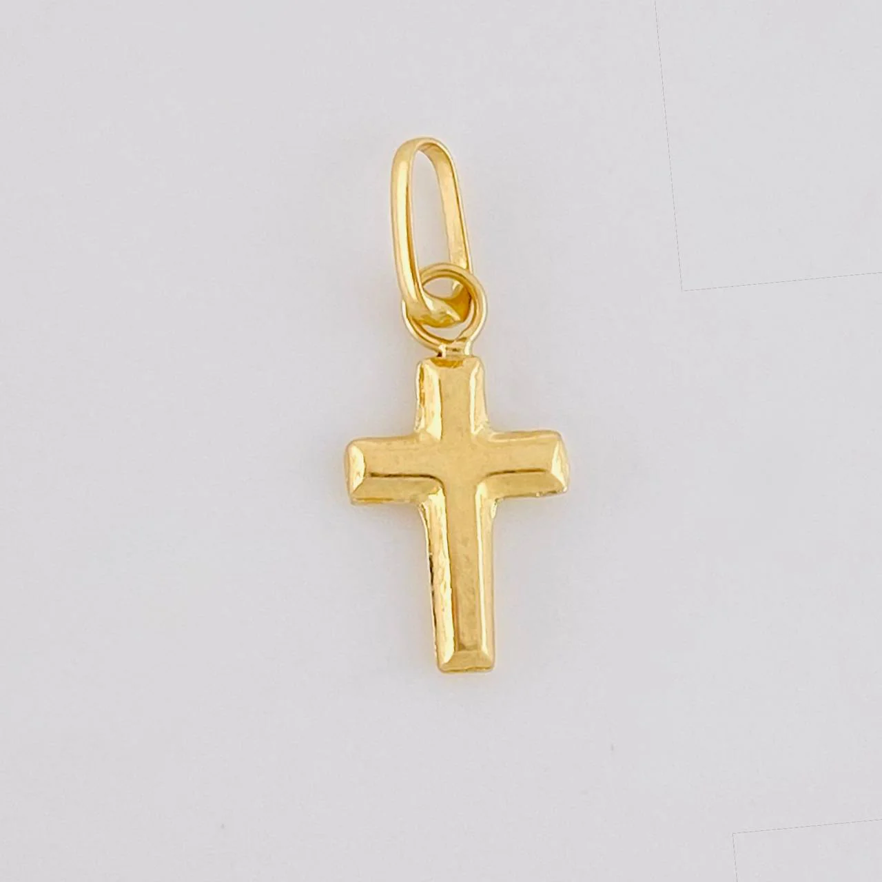 Dije Cruz Lisa 0.15g / 1/2 in Oro Amarillo 18K
