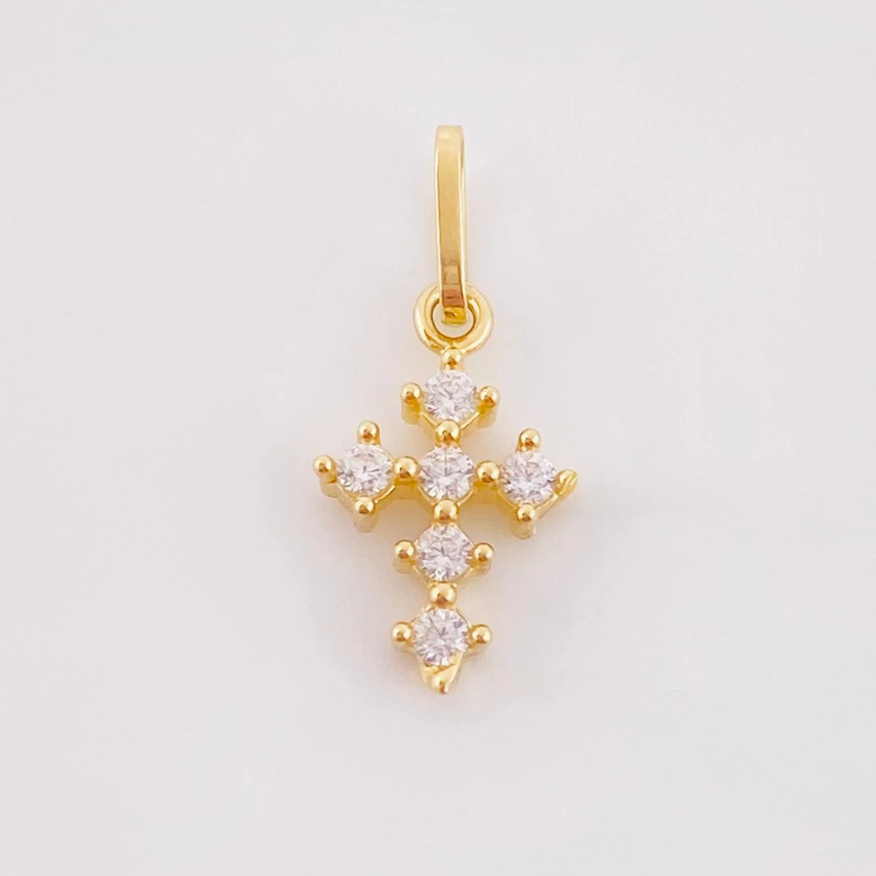 Dije Cruz Tupida 0.4gr / 1/2 in / Oro Amarillo 18K *