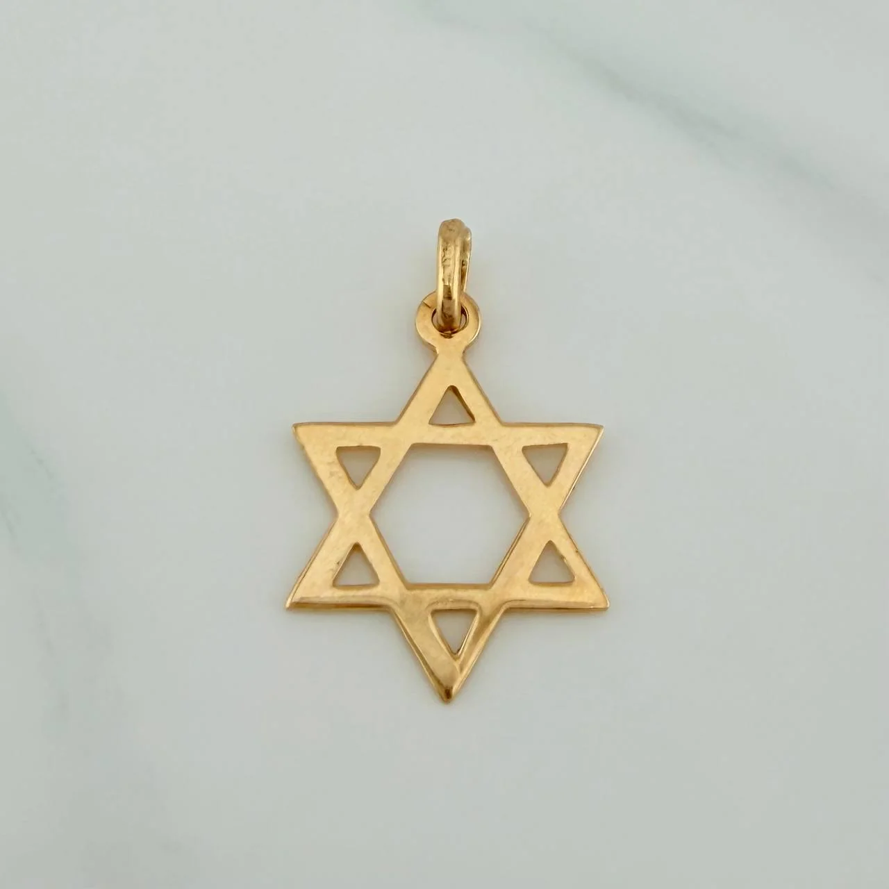 Dije Estrella De David 1.35gr / 1 in / Oro Amarillo 18K $