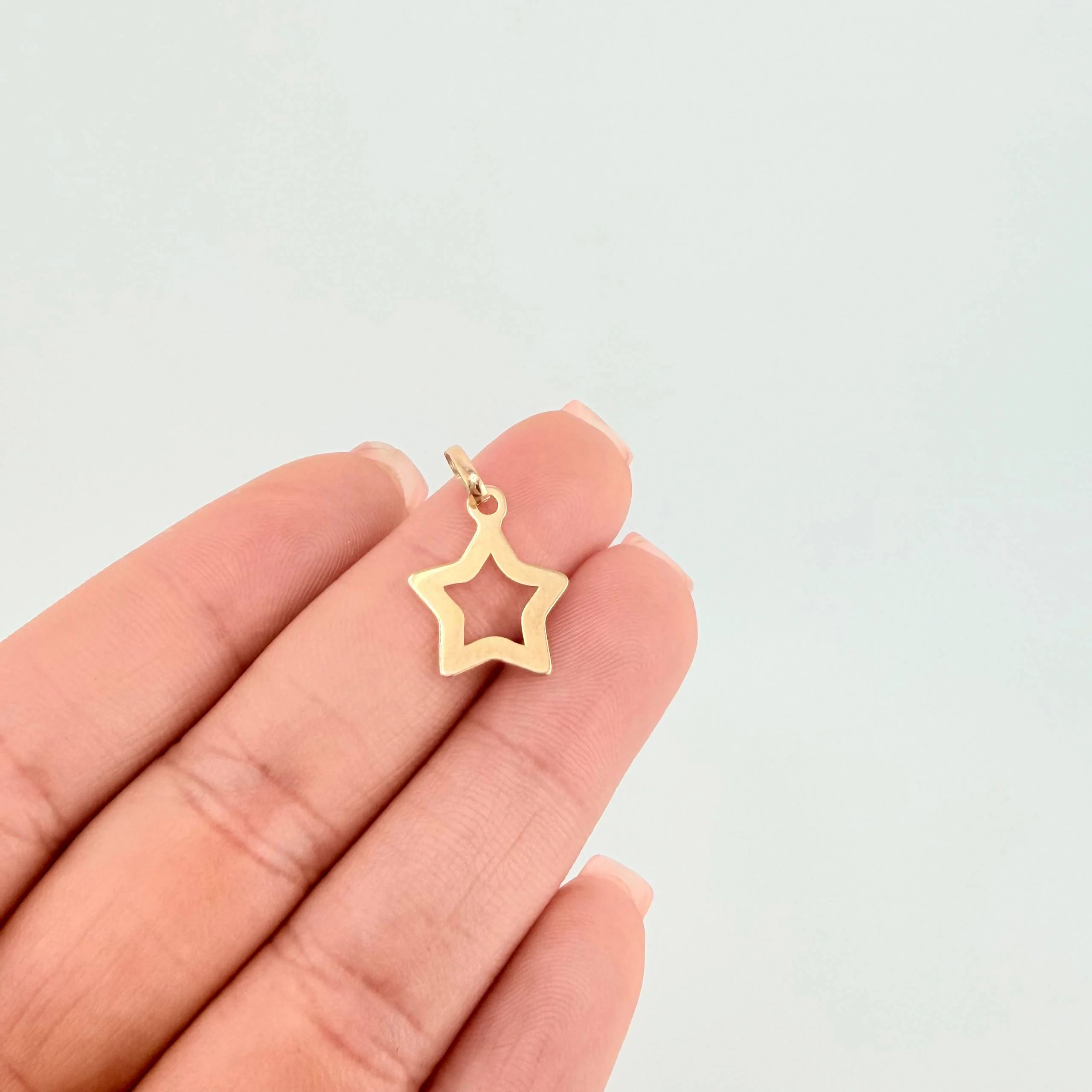Dije Estrella Silueta 0.45gr / 3/4 in / Oro Amarillo 18K - Image 4