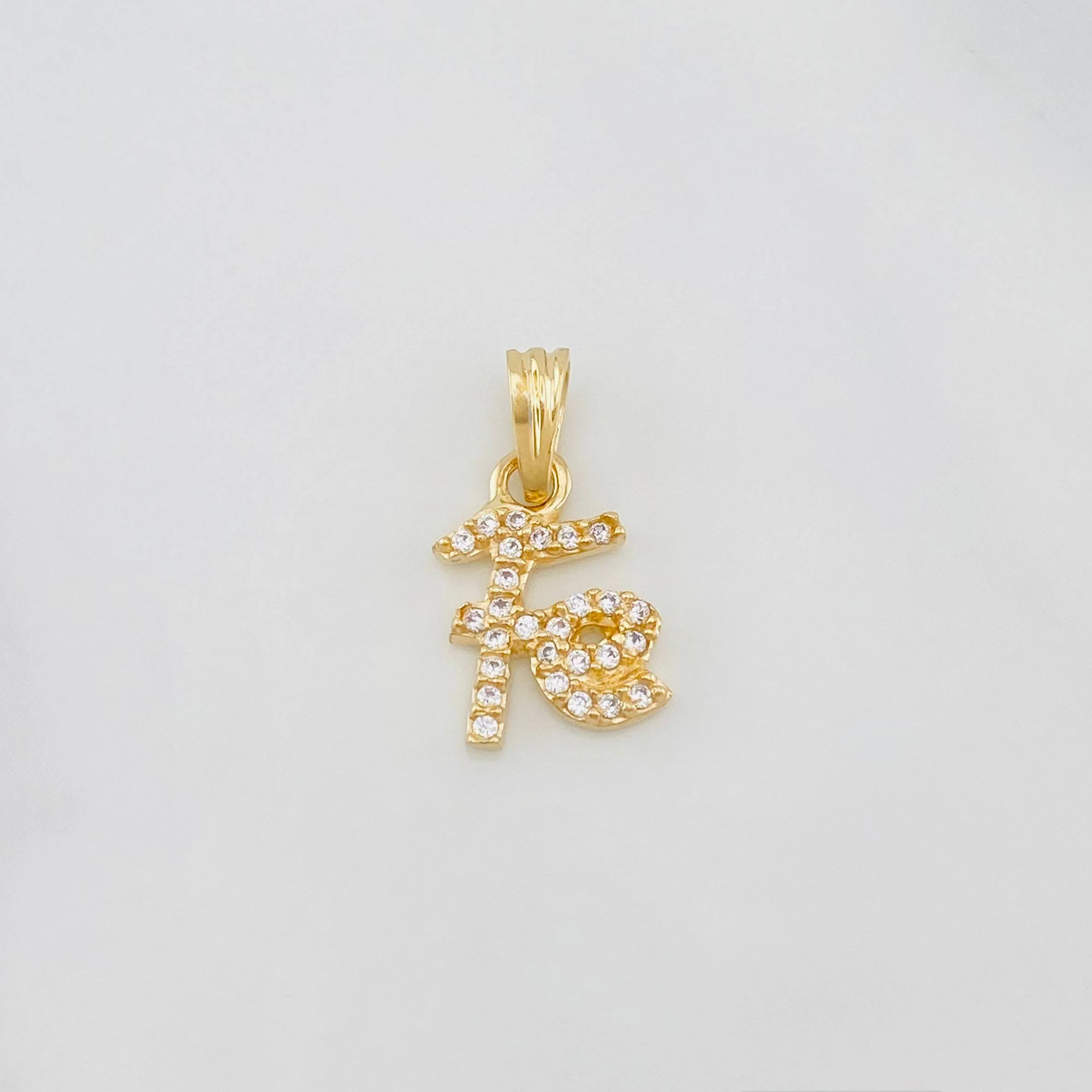 Dije Fe 1.1g / 1/2 in Oro Amarillo 18K