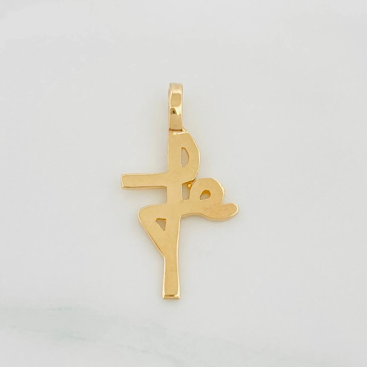 Dije Fe 1.2 g / 3/4 in Oro Amarillo 18K
