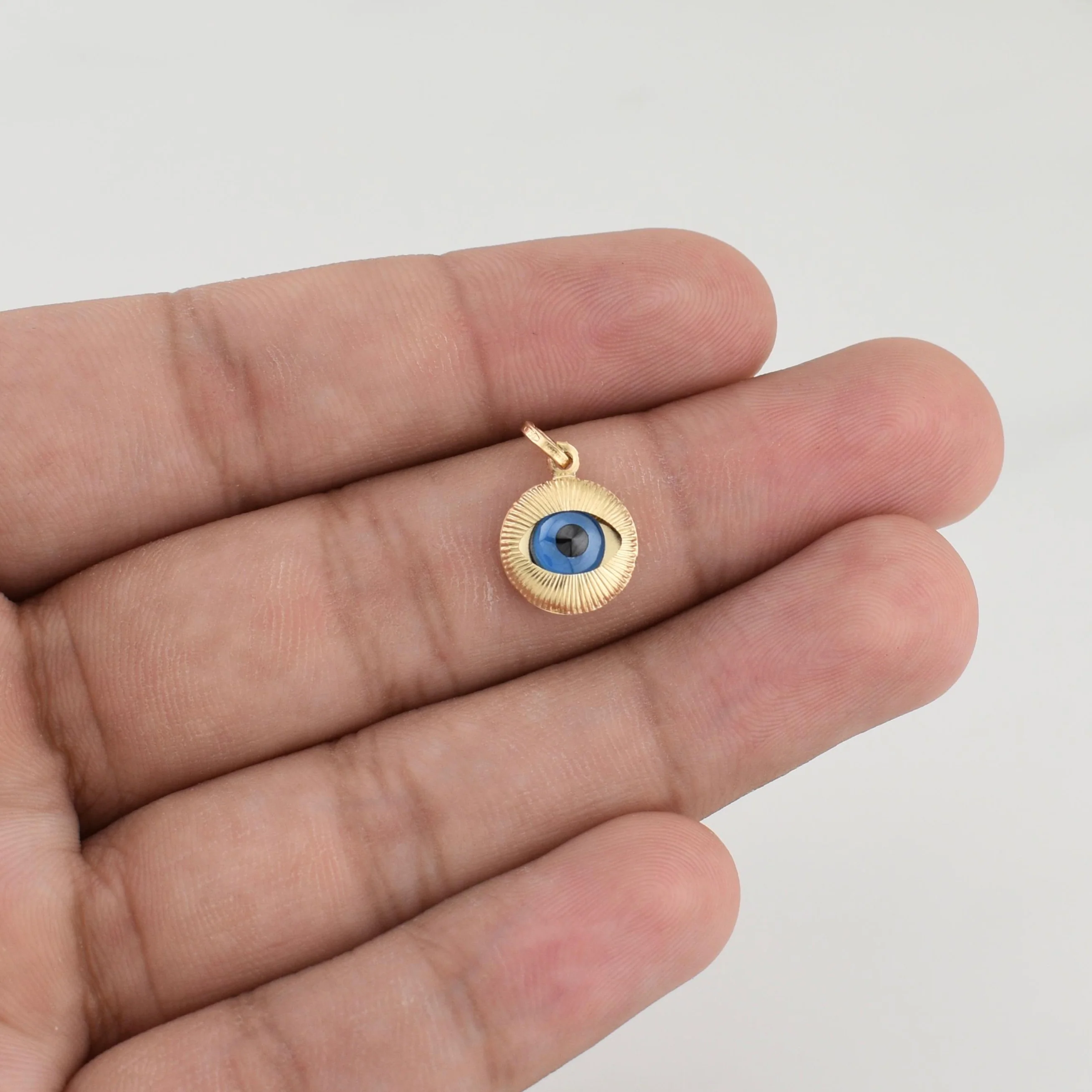 Dije Ojo Turco 0.9 g / 3/4 in Oro Amarillo 18K - Image 3