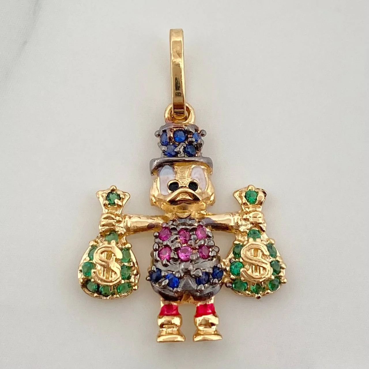 Dije Pato Bolsas de Dinero 1.7gr / 1 in / Dos Oros Negro Amarillo 18K %