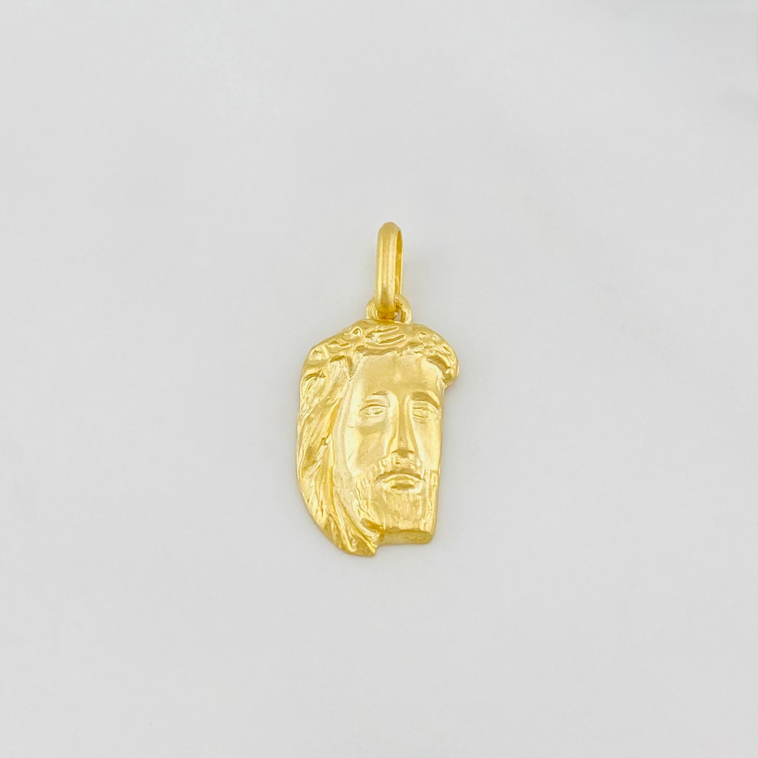 Dije Rostro cristo 0.7g / 3/4 in Oro Amarillo 18K