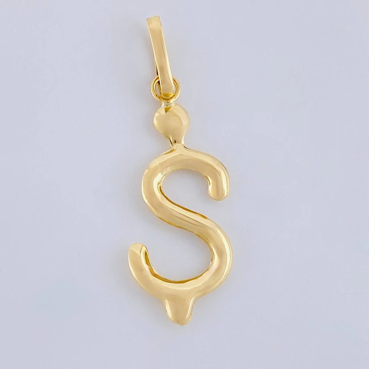 Dije Signo Pesos 0.8g / 1 1/4 in Oro Amarillo 18K