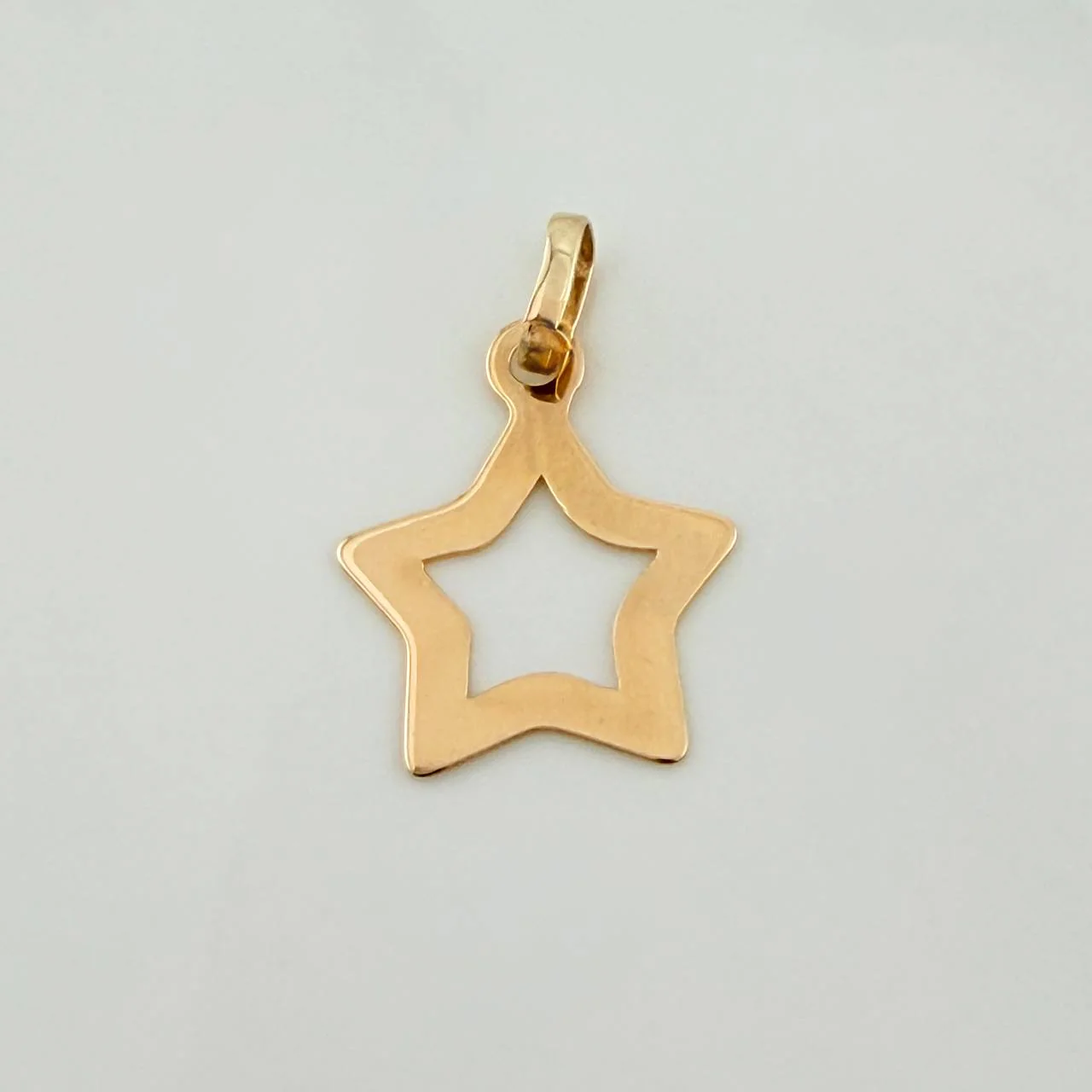 Dije Silueta Estrella 0.45gr / 3/4 in / Oro Amarillo 18K %