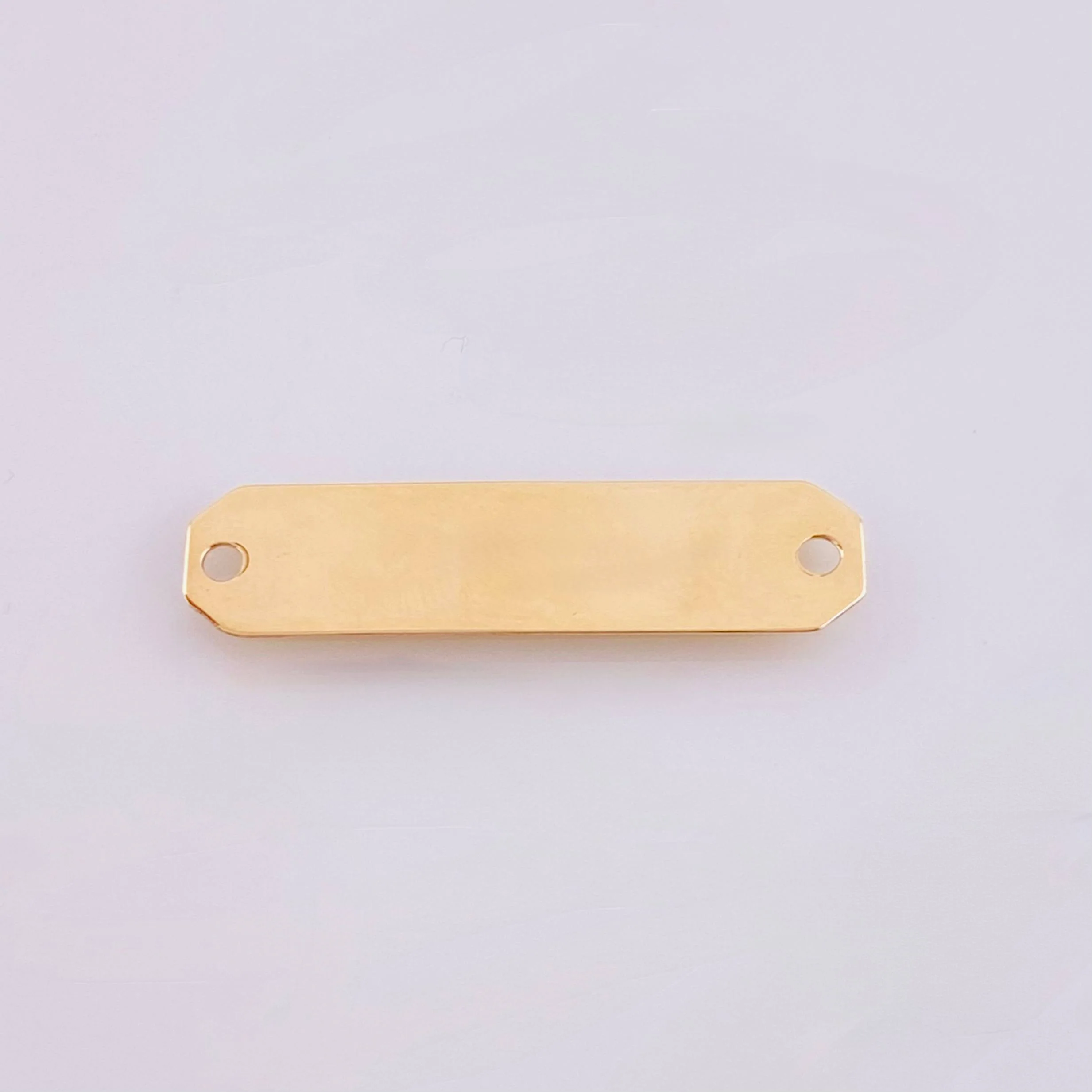 Herraje Placa Octagonal 0.8gr / 1 in / Oro Amarillo 18K ©