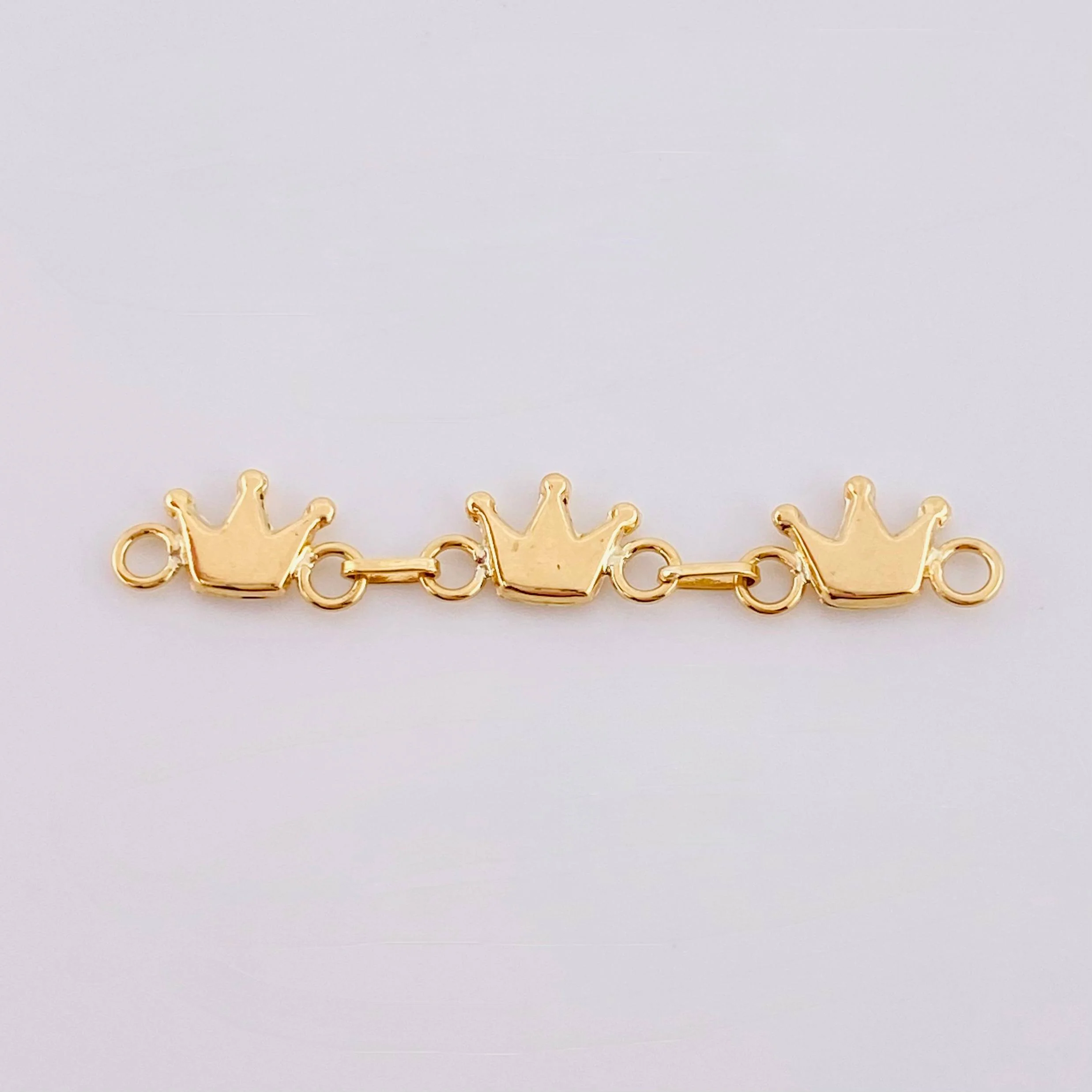 Herraje Retazo Coronas 0.85 g / 1 1/2 in Oro Amarillo 18K