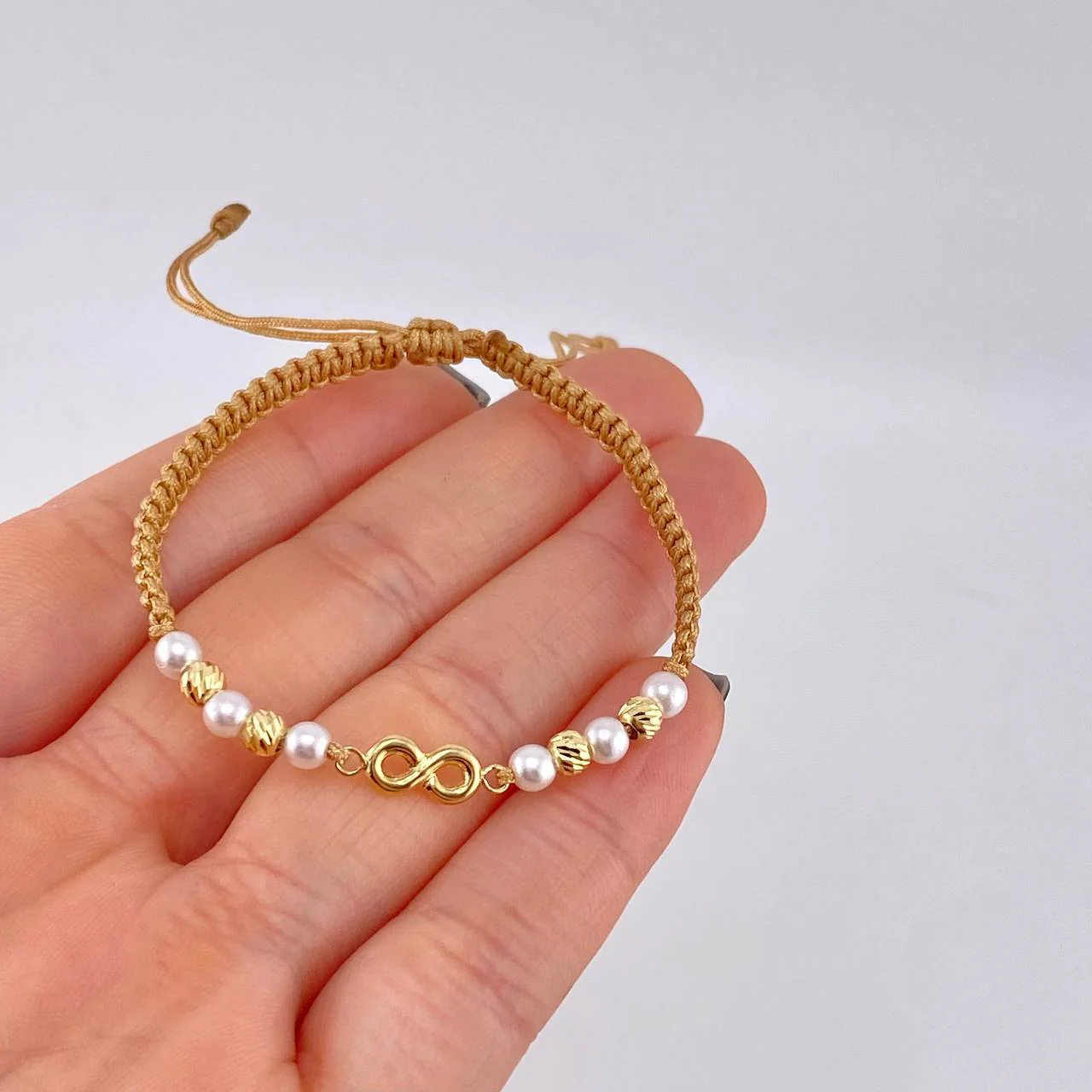 Pulsera Tejida Cafe Herraje Infinito Bolas Diamantadas 4Mm / 4 Und Oro Amarillo 18K - Image 3