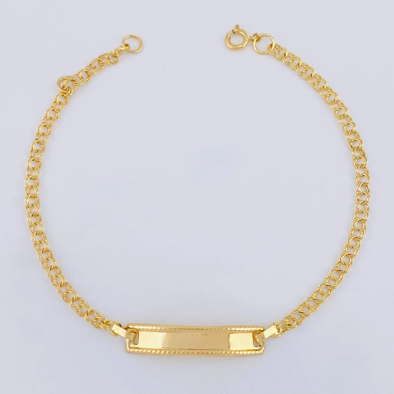 Pulso Bebé Aro Seguido Placa Rectangular Bordeada 1.25 g / 2.3 mm Oro Amarillo 18K