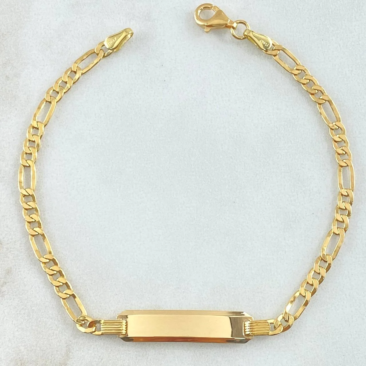 Pulso Figaro Placa Rectangular Curva 3.55gr / 7 in / 3.2mm Oro Amarillo +1 18K ©