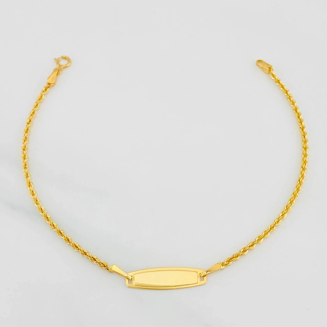 Pulso Lazo Placa 1.1g / 7 in / 1.5mm Oro Amarillo 18K