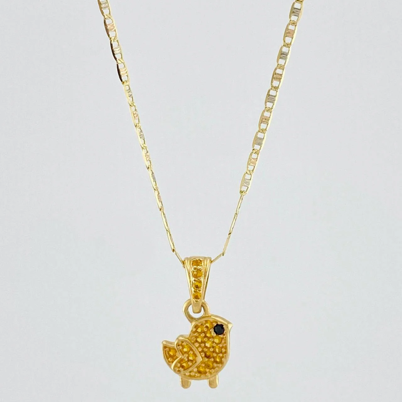 Set Cadena Escalera Plana + Dije Pajarito / 2.65g / 20 in Tres Oros 18K