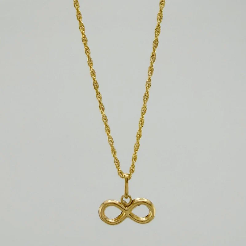 Set Cadena Lazo + Dije Infinito / 1,35 gr / 18 in Oro Amarillo 18K
