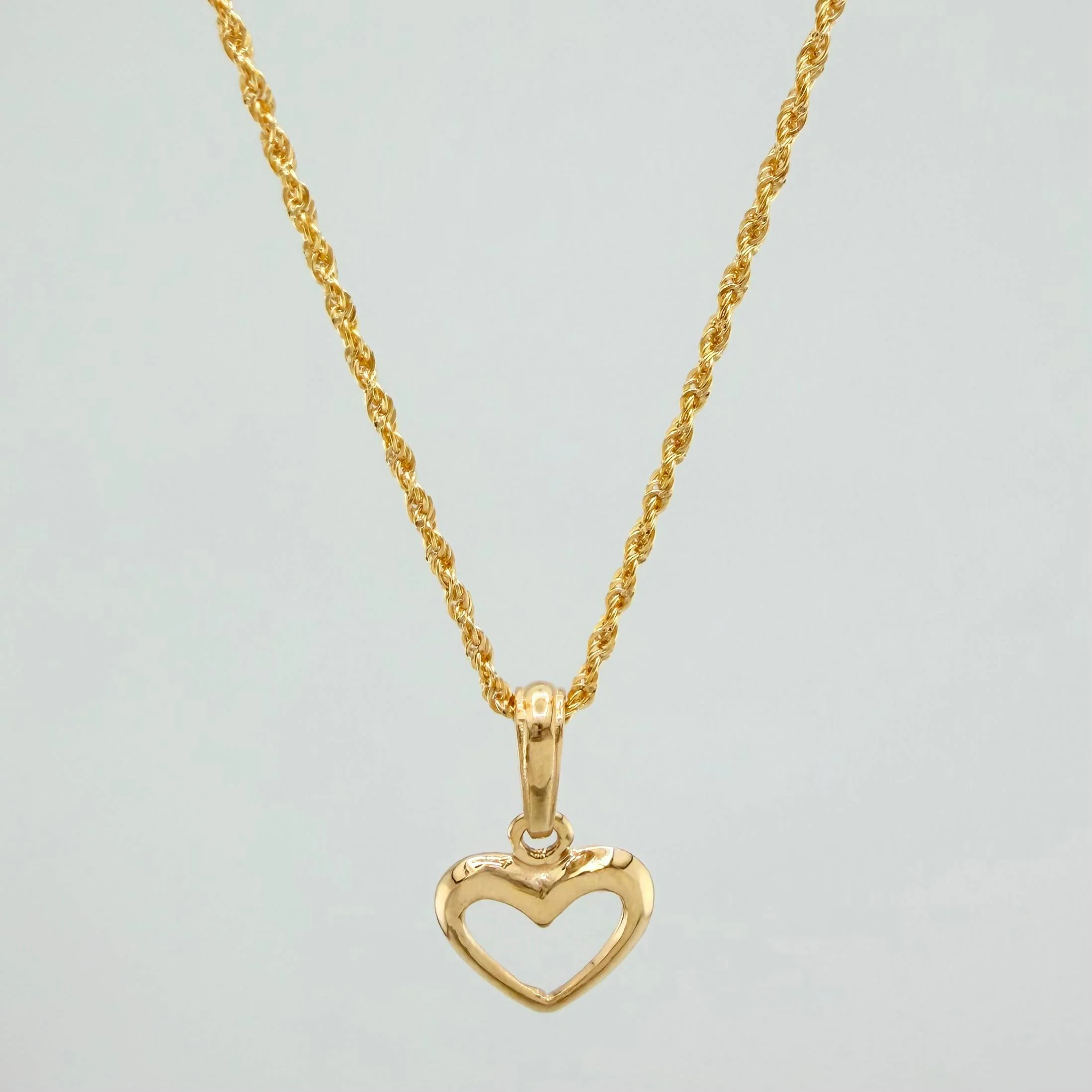 Set Cadena Lazo + Dije Silueta Corazon / 1.75gr / 19 1/2 in Oro Amarillo 18K