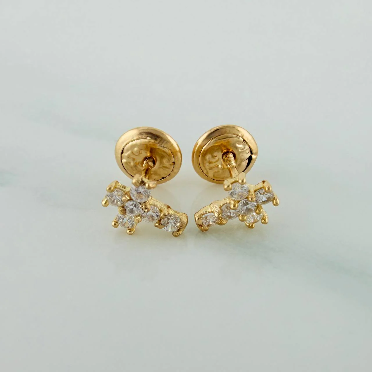 Topos Cruz 0.75gr / 5mm Oro Amarillo 18K %